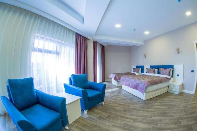 Imagen de la habitación del Hotel My Rose Boutique. Foto 11