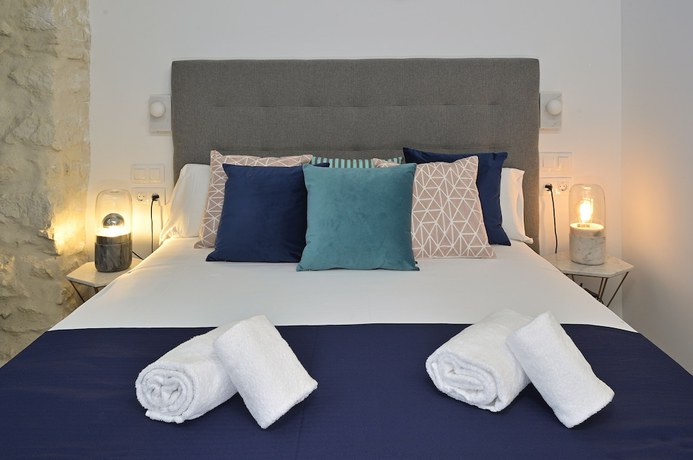 Imagen de la habitación del Hotel MyFlats Luxury Downtown. Foto 7