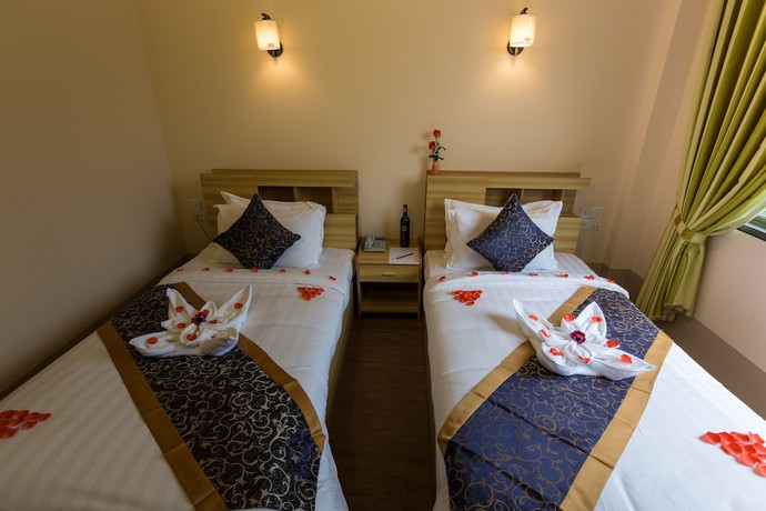 Imagen de la habitación del Hotel Mya Taw Win. Foto 12