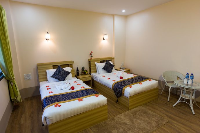Imagen de la habitación del Hotel Mya Taw Win. Foto 14