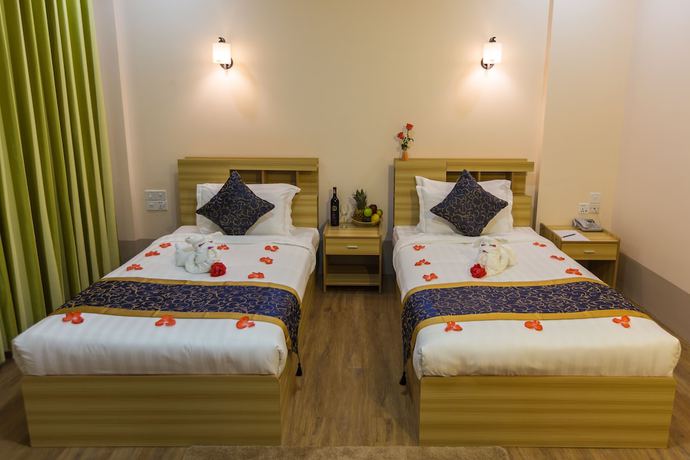 Imagen de la habitación del Hotel Mya Taw Win. Foto 17