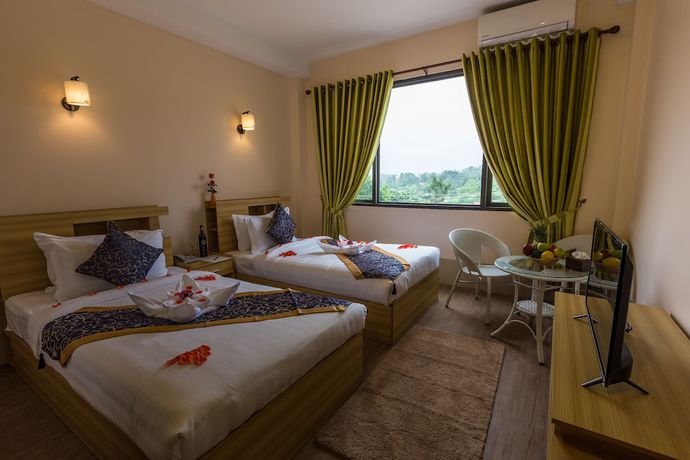 Imagen de la habitación del Hotel Mya Taw Win. Foto 18