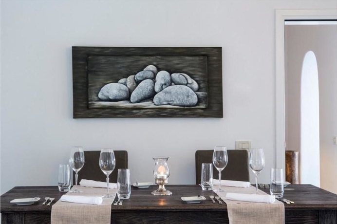 Imagen de la habitación del Hotel Myconian Ambassador Relais and Chateaux. Foto 11