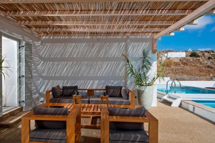 Imagen de la habitación del Hotel Myconian Ambassador Relais and Chateaux. Foto 12