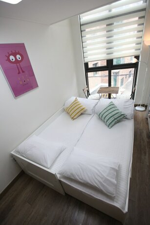 Imagen de la habitación del Hotel Myeongdong Artmonstay Guesthouse. Foto 13