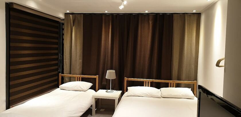 Imagen de la habitación del Hotel Myeongdong Artmonstay Guesthouse. Foto 14