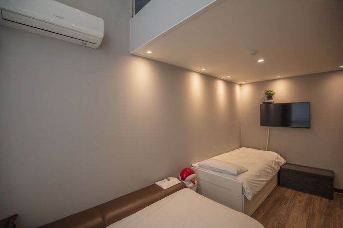 Imagen de la habitación del Hotel Myeongdong Artmonstay Guesthouse. Foto 15