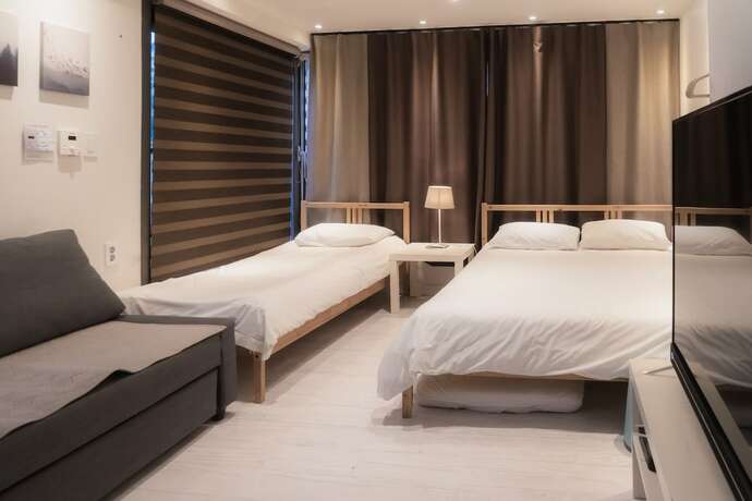Imagen de la habitación del Hotel Myeongdong Artmonstay Guesthouse. Foto 18