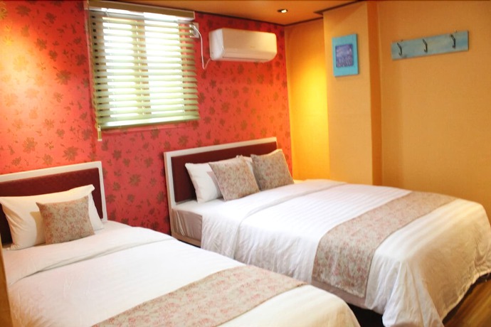 Imagen de la habitación del Hotel Myeongdong Guesthouse Como. Foto 6