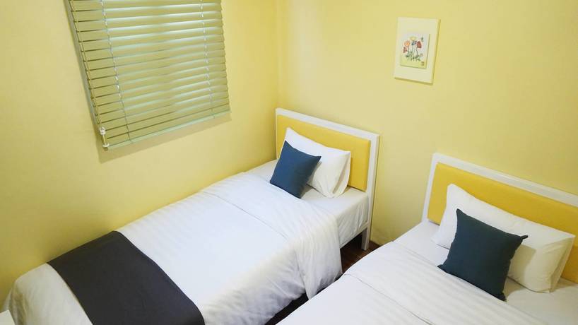 Imagen de la habitación del Hotel Myeongdong Guesthouse Como. Foto 7