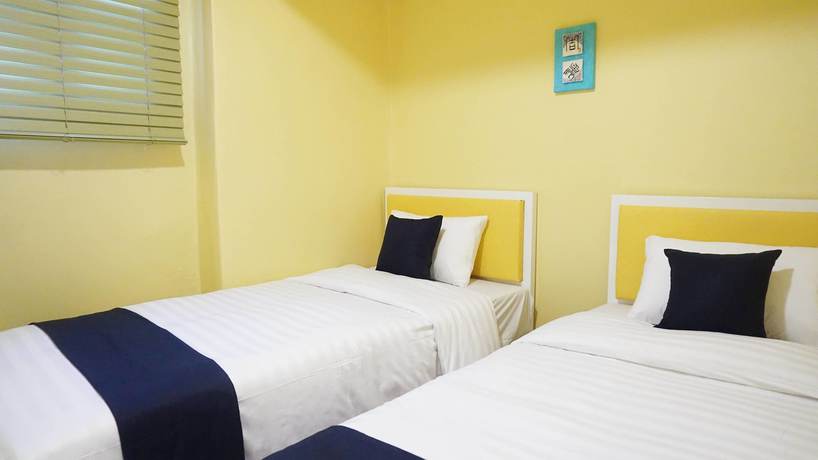 Imagen de la habitación del Hotel Myeongdong Guesthouse Como. Foto 10