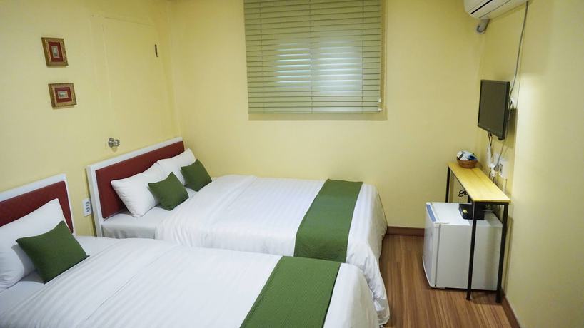 Imagen de la habitación del Hotel Myeongdong Guesthouse Como. Foto 12