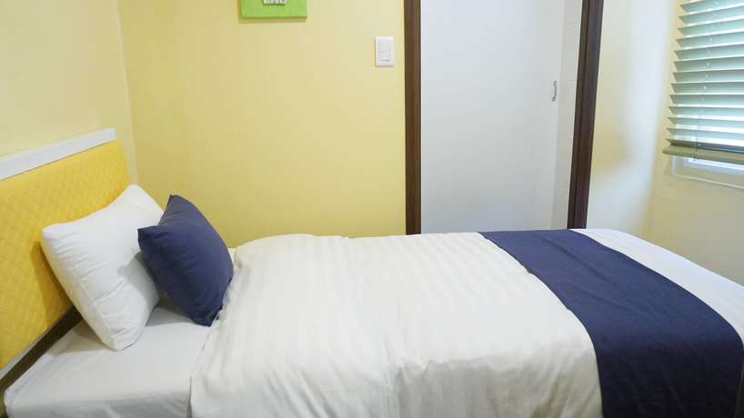 Imagen de la habitación del Hotel Myeongdong Guesthouse Como. Foto 13