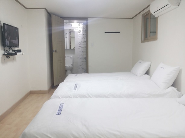 Imagen de la habitación del Hotel Myeongdong Guesthouse. Foto 3