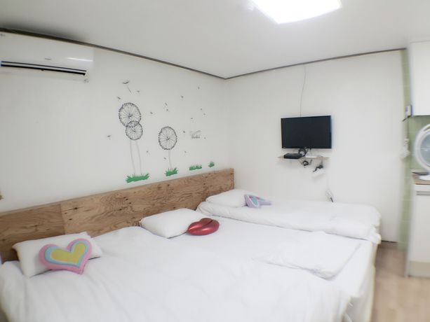 Imagen de la habitación del Hotel Myeongdong Guesthouse. Foto 10