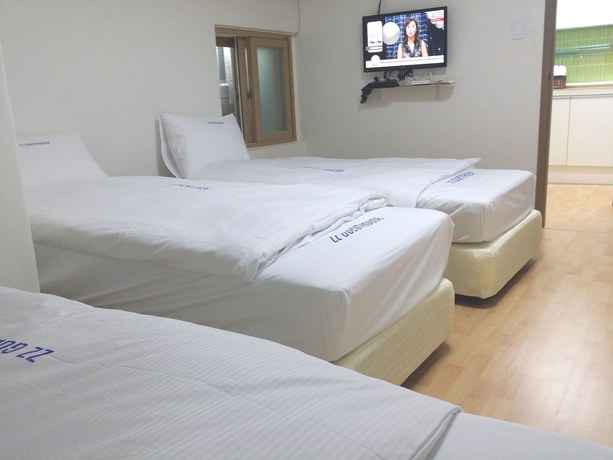Imagen de la habitación del Hotel Myeongdong Guesthouse. Foto 13