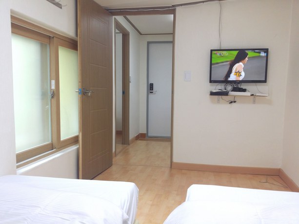 Imagen de la habitación del Hotel Myeongdong Guesthouse. Foto 16