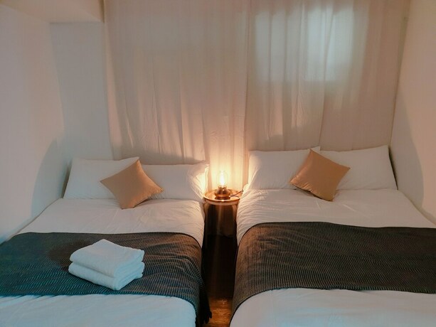 Imagen de la habitación del Hotel Myeongdong Sky Castle House. Foto 31