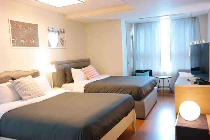 Imagen de la habitación del Hotel Myeongdong Studio. Foto 18