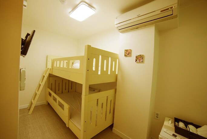 Imagen de la habitación del Hotel Myeongdong Sunshine Guesthouse. Foto 13