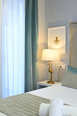 Imagen de la habitación del Hotel Myflats Rambla Collection. Foto 12