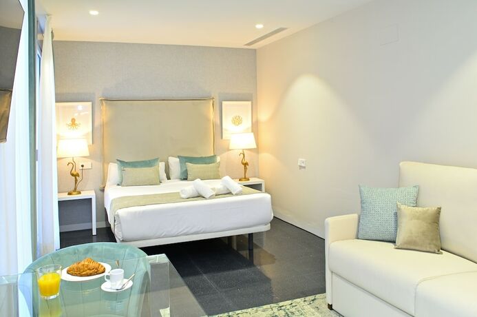 Imagen de la habitación del Hotel Myflats Rambla Collection. Foto 18