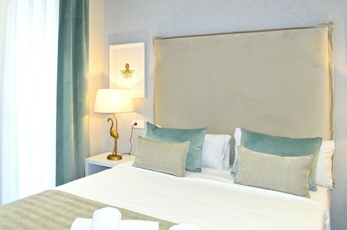 Imagen de la habitación del Hotel Myflats Rambla Collection. Foto 20