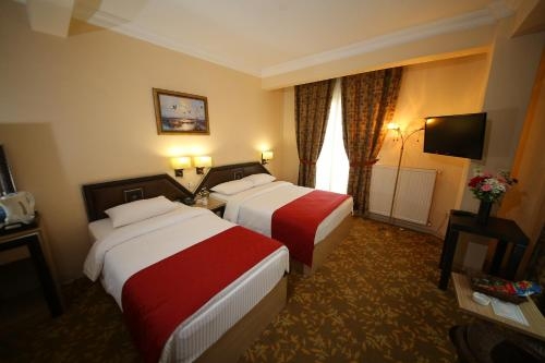 Imagen de la habitación del Hotel Myhouse. Foto 6
