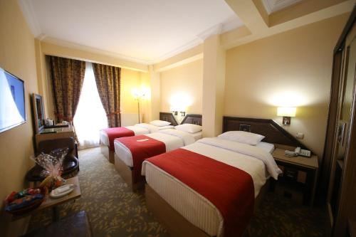 Imagen de la habitación del Hotel Myhouse. Foto 8