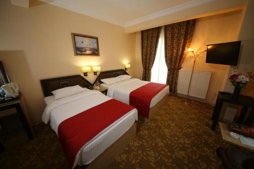 Imagen de la habitación del Hotel Myhouse. Foto 9