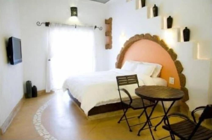 Imagen de la habitación del Hotel Mykonos Blu. Foto 8