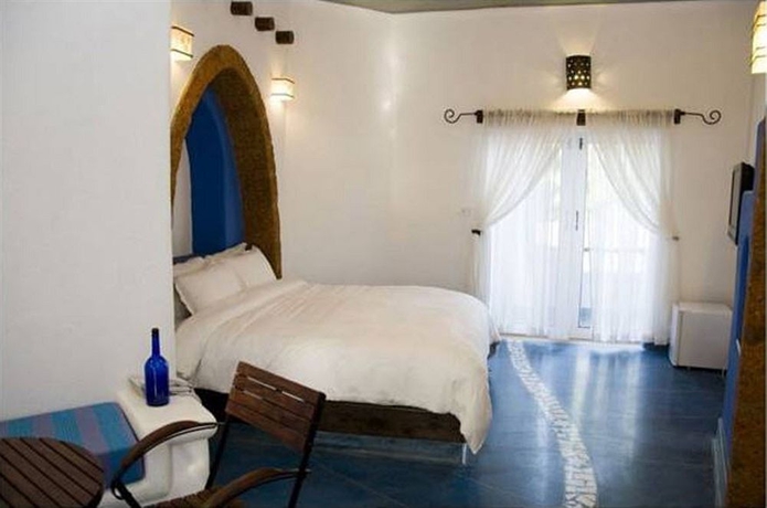 Imagen de la habitación del Hotel Mykonos Blu. Foto 2