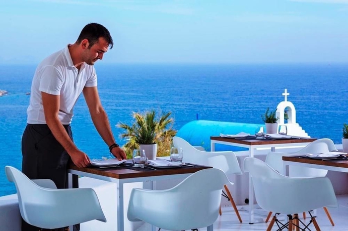 Imagen del bar/restaurante del Hotel Mykonos Moments - Pietra E Mare. Foto 2
