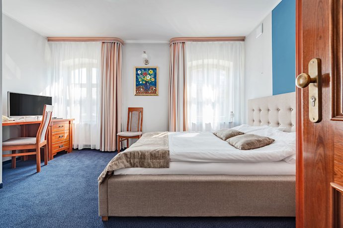 Imagen de la habitación del Hotel Młyn. Foto 7