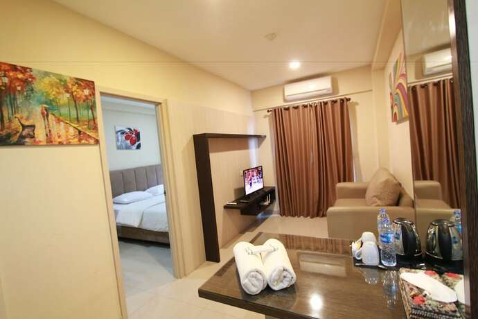 Imagen de la habitación del Hotel Myrooms Bekasi. Foto 24