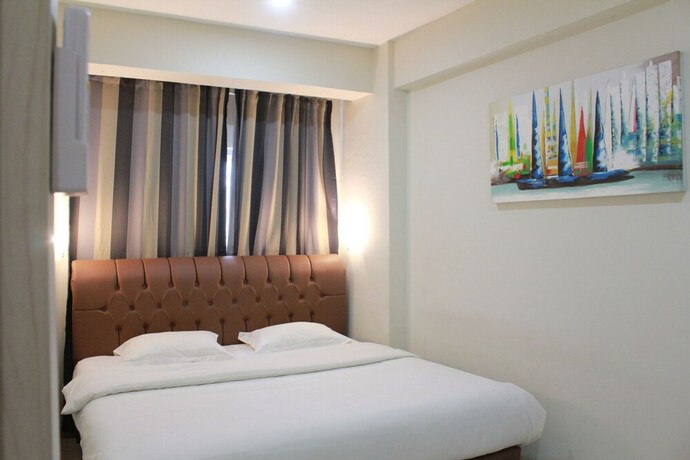 Imagen de la habitación del Hotel Myrooms Bekasi. Foto 28