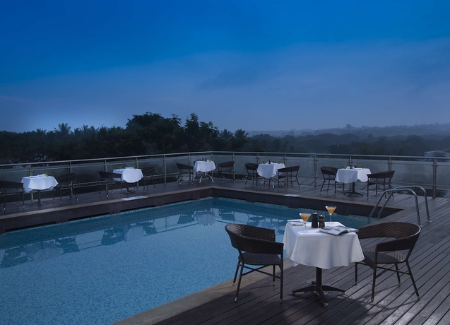 Imagen de la piscina del Hotel Mysore County Retreat. Foto 19