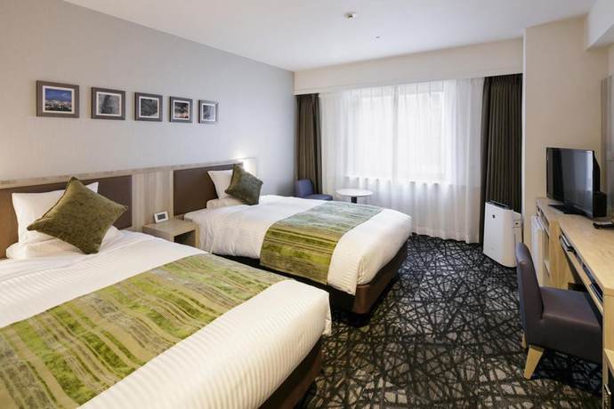 Imagen de la habitación del Hotel Mystays Kagoshima Tenmonkan. Foto 14