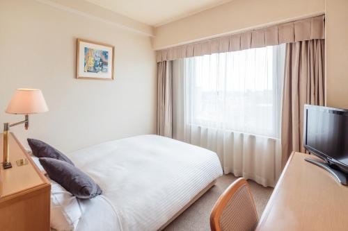 Imagen de la habitación del Hotel Mystays Matsuyama. Foto 9