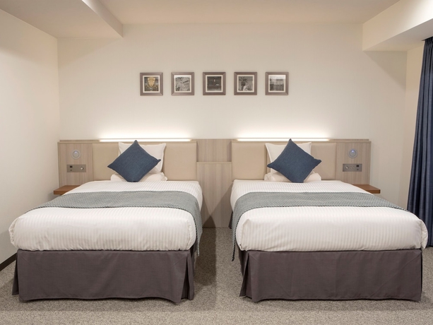 Imagen de la habitación del Hotel Mystays Midosuji Honmachi. Foto 9