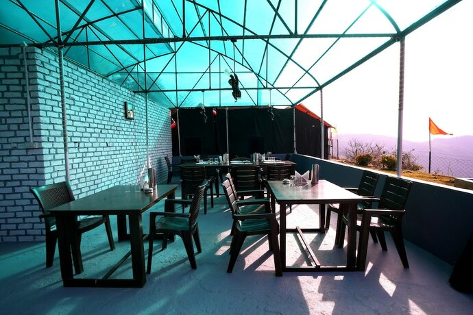 Imagen del bar/restaurante del Hotel Mystery Hills Resort. Foto 16