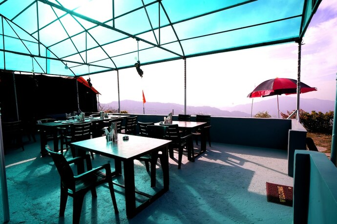 Imagen del bar/restaurante del Hotel Mystery Hills Resort. Foto 17