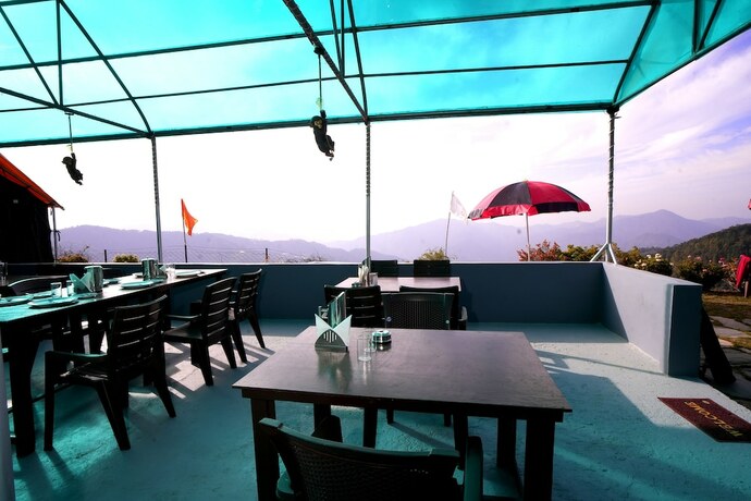 Imagen del bar/restaurante del Hotel Mystery Hills Resort. Foto 19