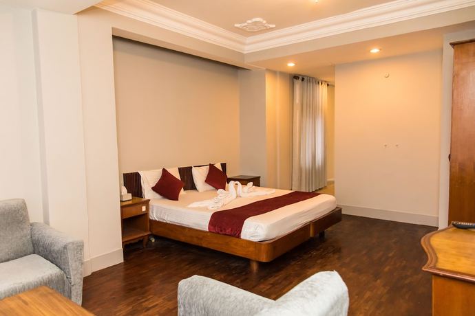 Imagen de la habitación del Hotel Mystic Homes and Apartments. Foto 18