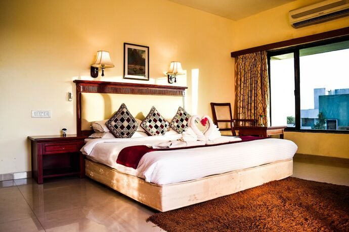 Imagen de la habitación del Hotel Mystic Valley Spa Resort. Foto 13