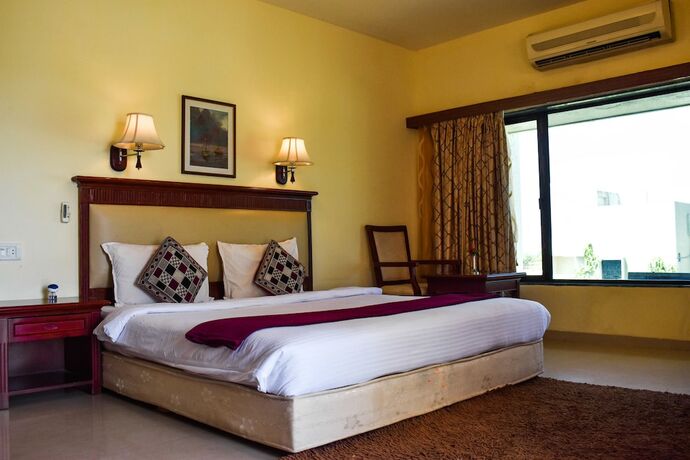 Imagen de la habitación del Hotel Mystic Valley Spa Resort. Foto 21