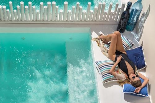 Imagen de la habitación del Hotel Mythical Blue Luxury Suites. Foto 9