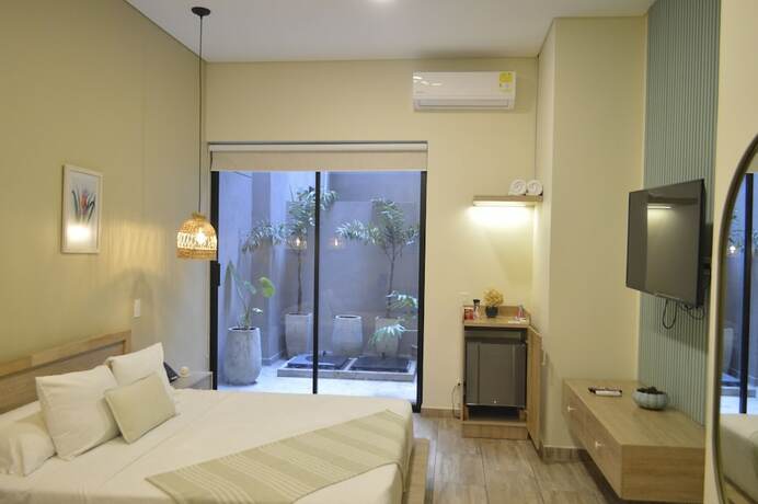 Imagen de la habitación del Hotel Mythical. Foto 19