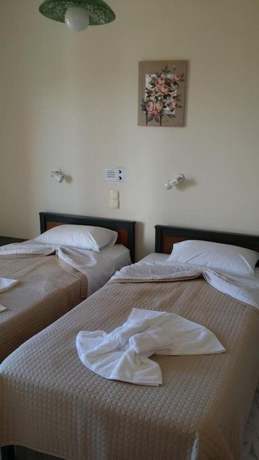 Imagen de la habitación del Hotel Mythos Beach. Foto 8
