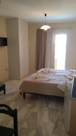 Imagen de la habitación del Hotel Mythos Beach. Foto 14
